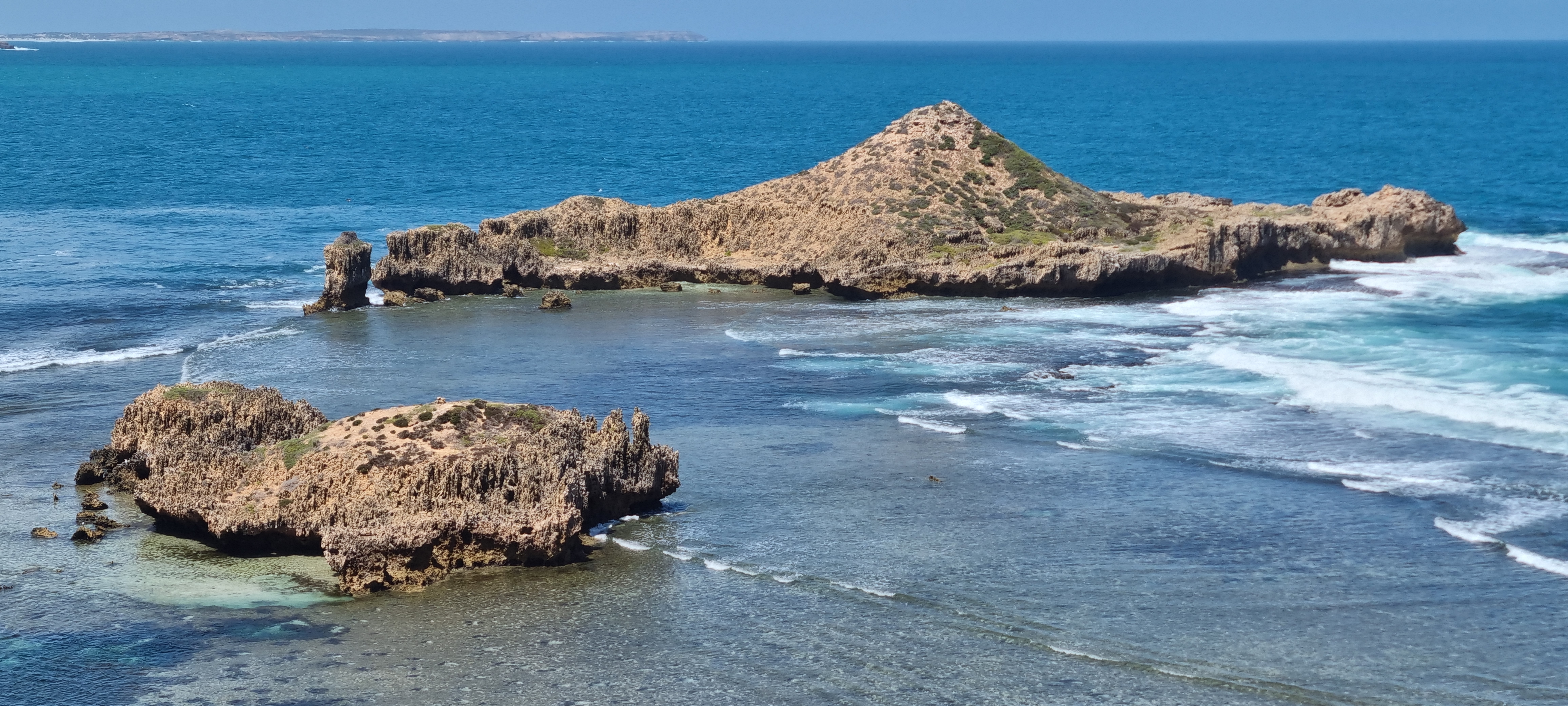 The sombrero-shaped limestone island formation off the rugged South Australian coastline.
